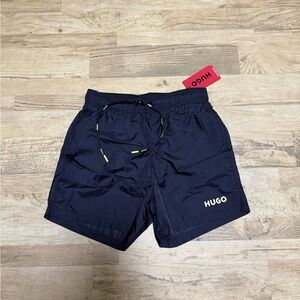 HUGO Black Swim Trunks with Red Logo Accents